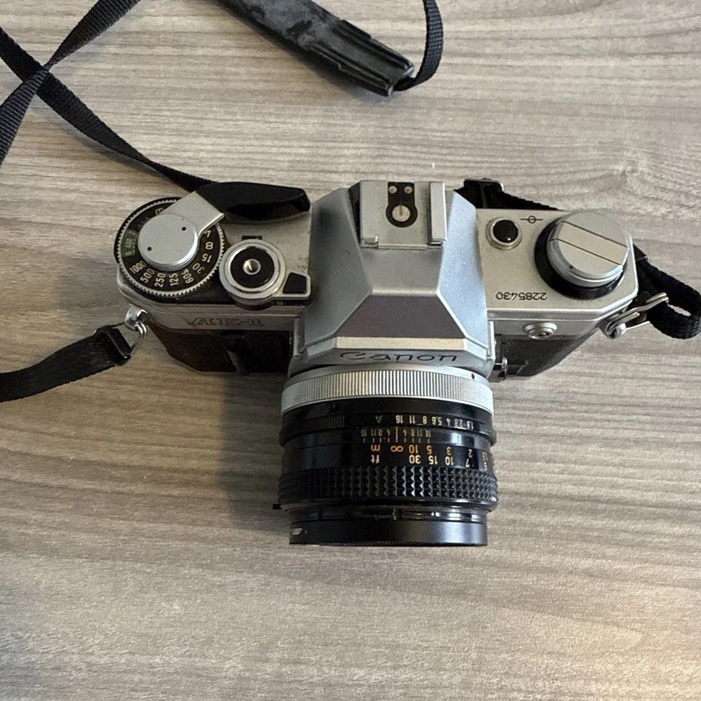 Canon AE-1 SLR 35mm Film Camera w/ Canon Lens FD 50mm F1.8!l Tested Works